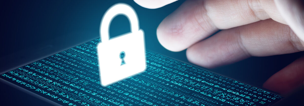 Hand reaching for padlock icon floating above computer screen