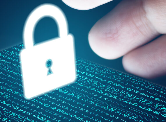 Hand reaching for padlock icon floating above computer screen