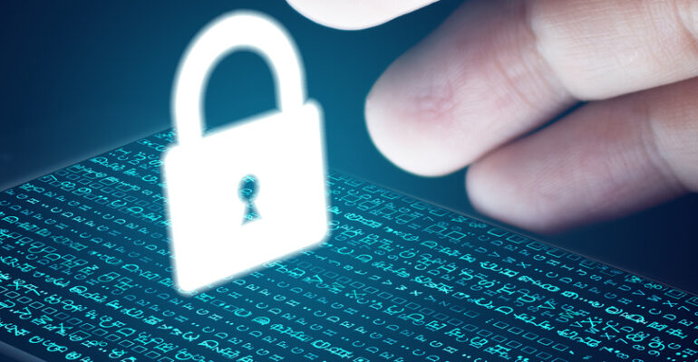 Hand reaching for padlock icon floating above computer screen