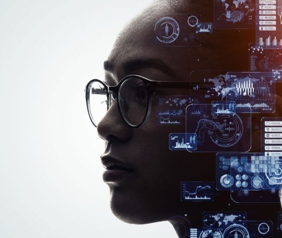 Profile of a woman wearing glasses with technology icons floating around her