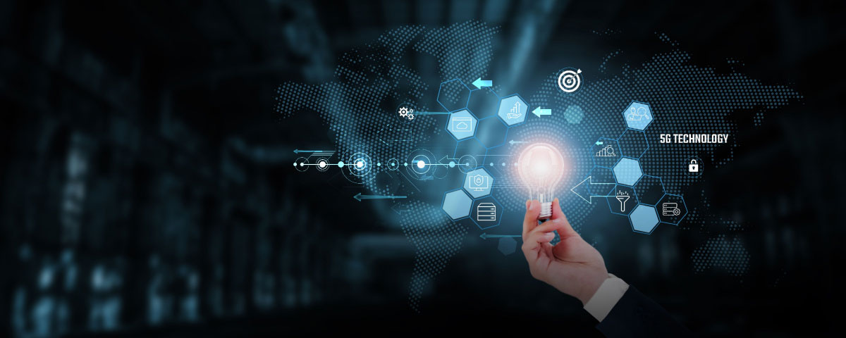 Hand holding light bub surrounded by iOT icons