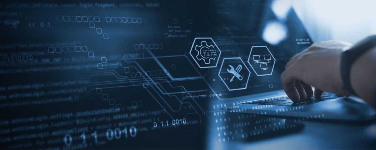 Programmer coding on laptop with IT icons floating above his hands