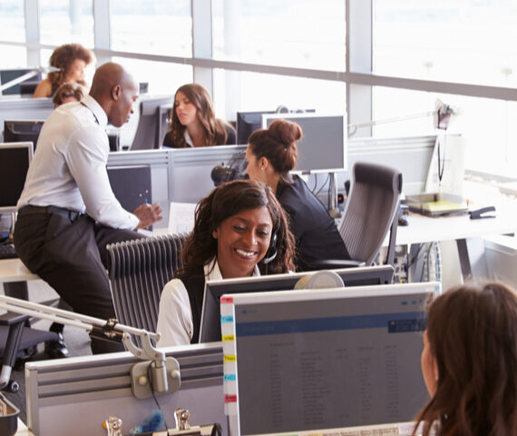 Happy business people in an open office