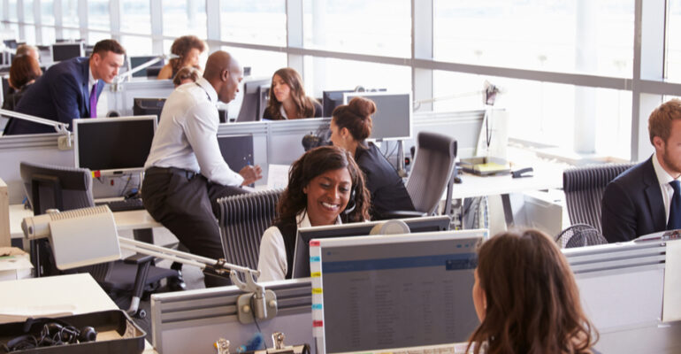 Happy business people in an open office